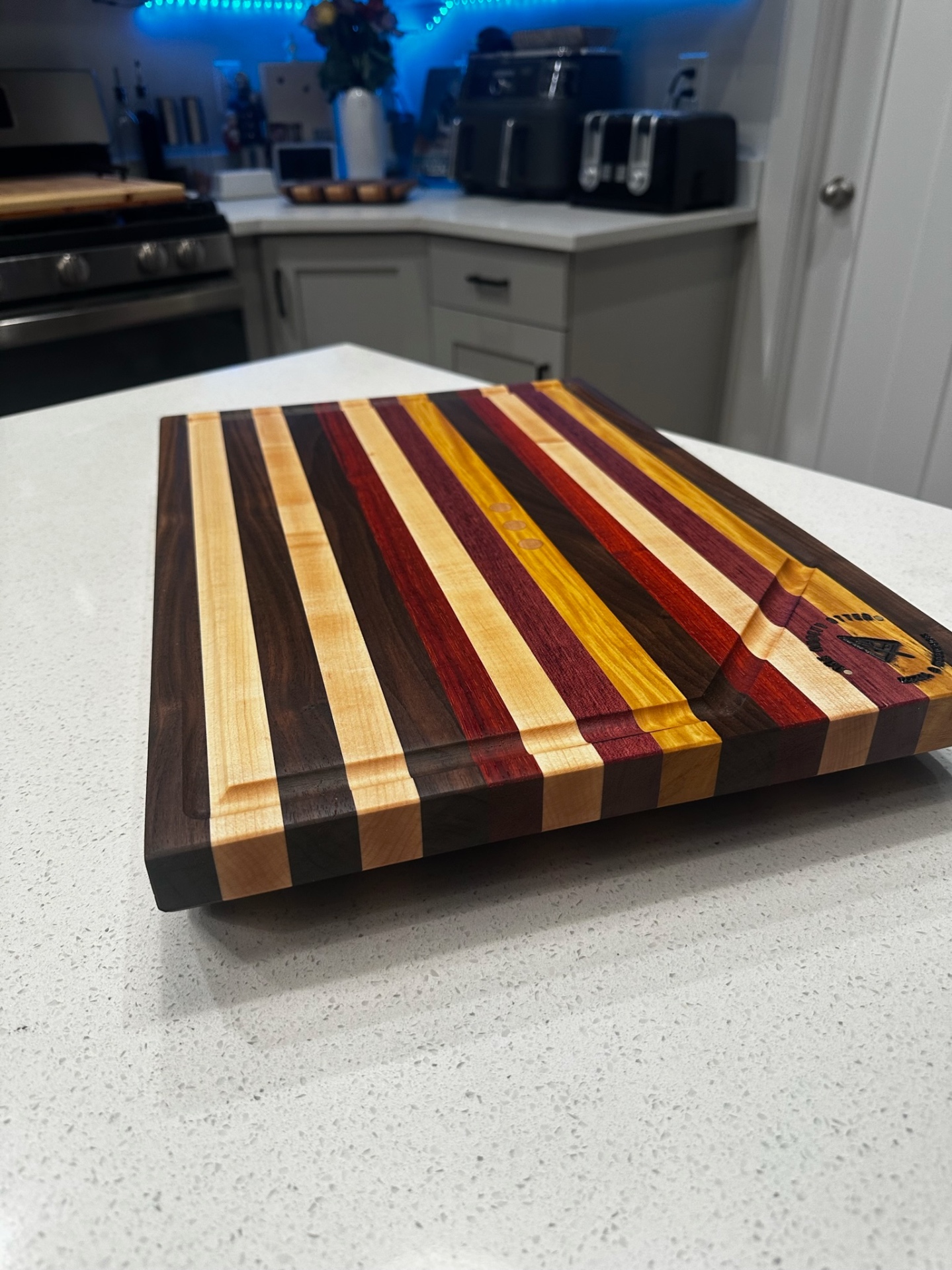 Handcrafted wood board by The Knotty Otter